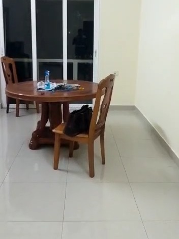Dining area by the balcony door in an Abode Valley flat, Potheri